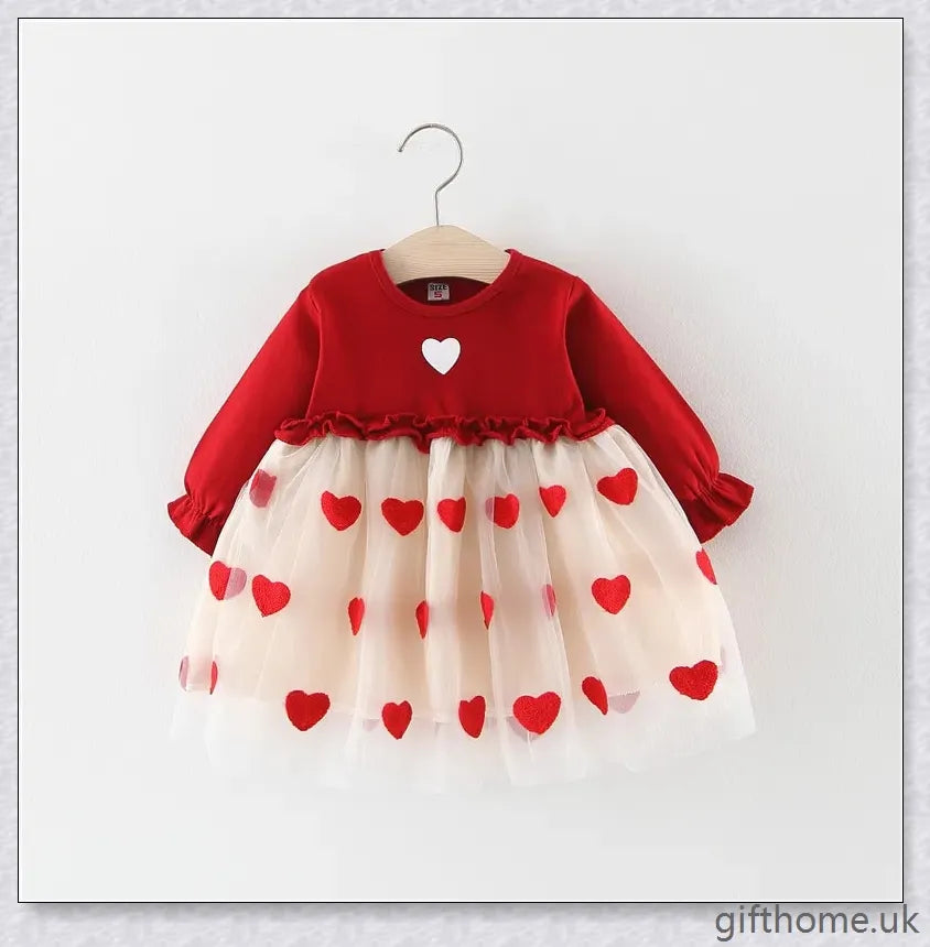 Soft, premium cotton baby girl dress with charming bow detail and cosy corduroy fabric