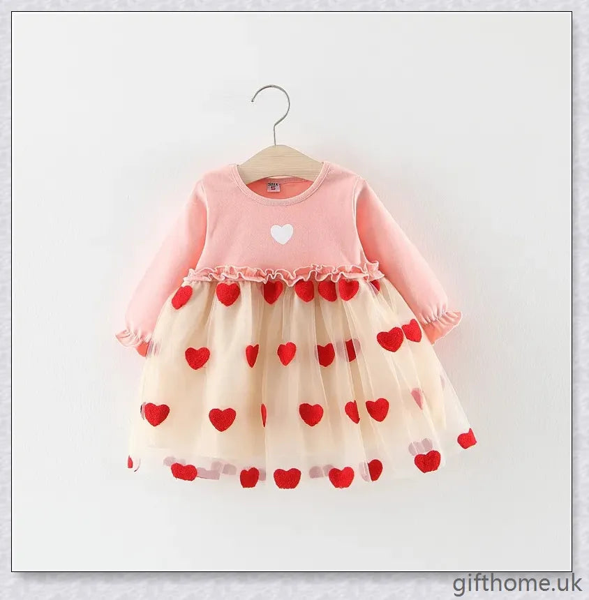 Soft, premium cotton baby girl dress with charming bow detail and cosy corduroy fabric