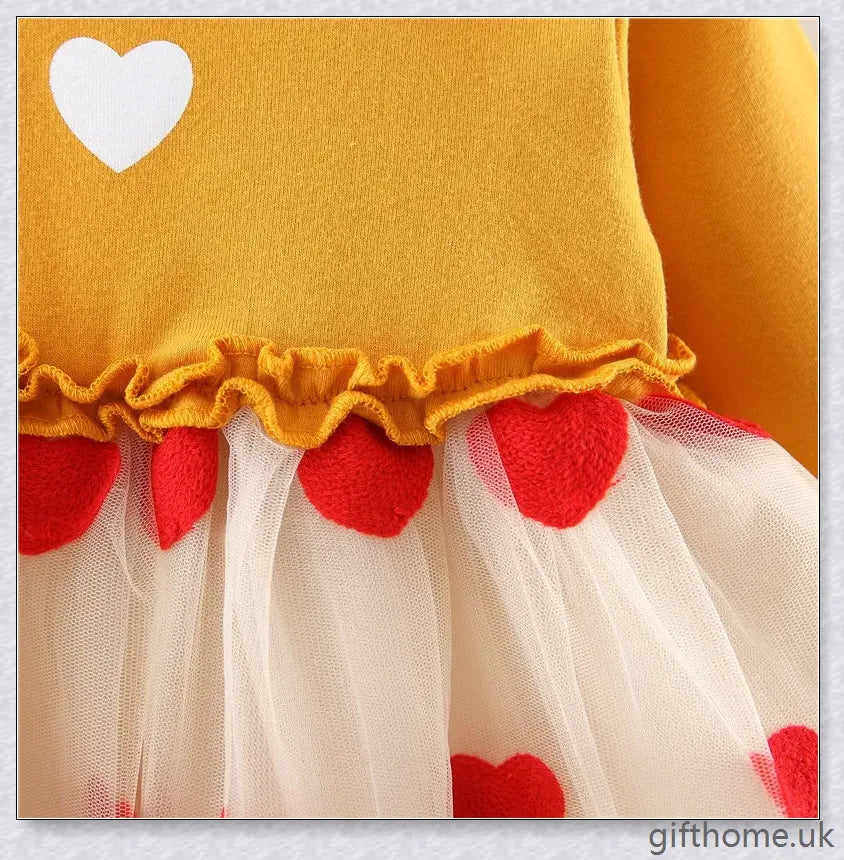 Soft, premium cotton baby girl dress with charming bow detail and cosy corduroy fabric
