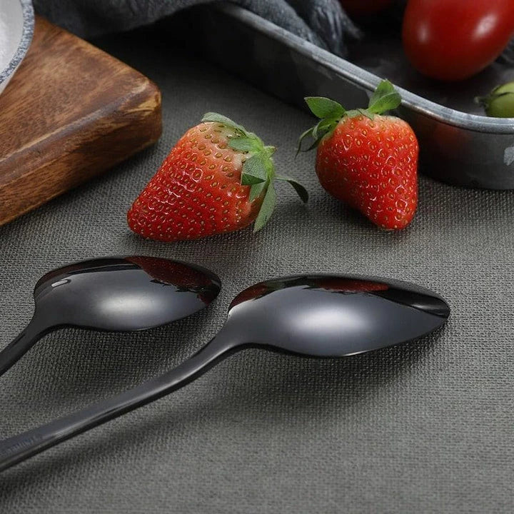 Premium black tableware set made of durable stainless steel with elegant design for formal and casual dining