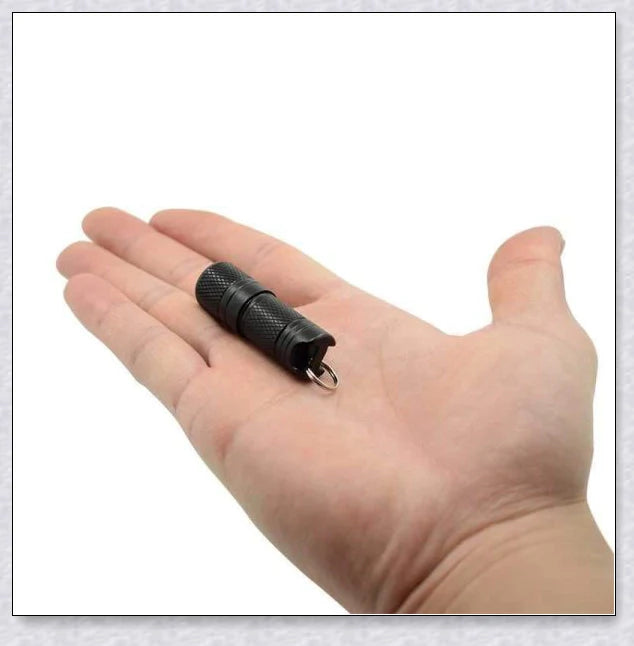 A compact, powerful LED flashlight with an aluminium alloy body, IPX8 waterproof rating, and long-lasting battery life.