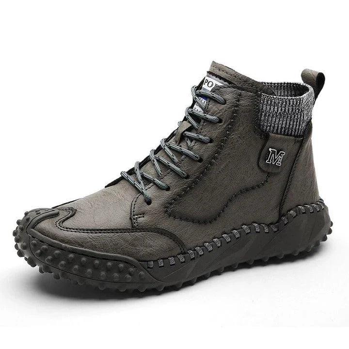 Stylish high-top leather boots in black, grey, and brown colours with a comfortable, breathable design