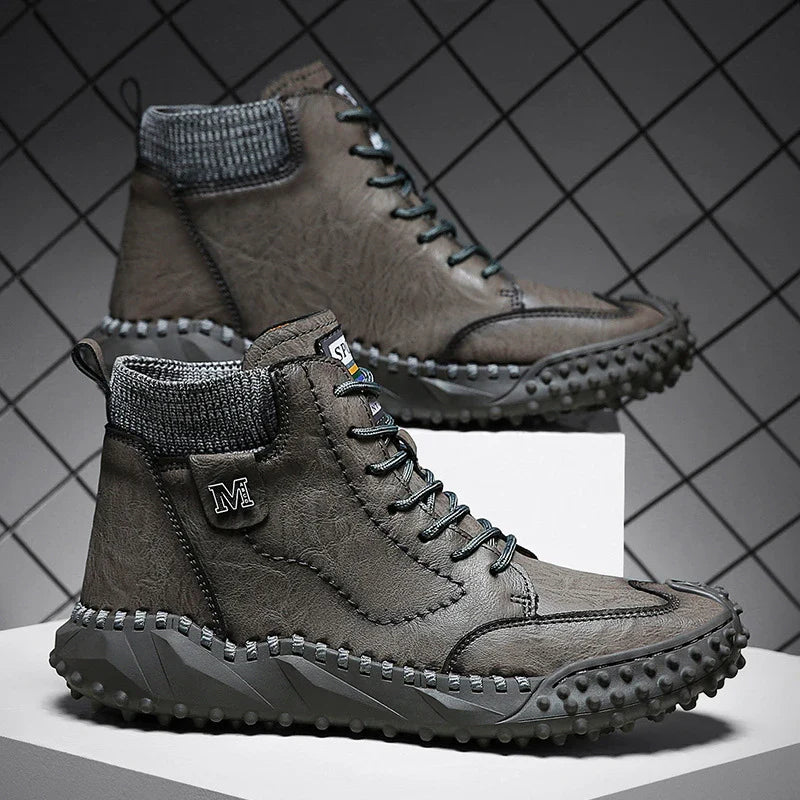 Stylish high-top leather boots in black, grey, and brown colours with a comfortable, breathable design