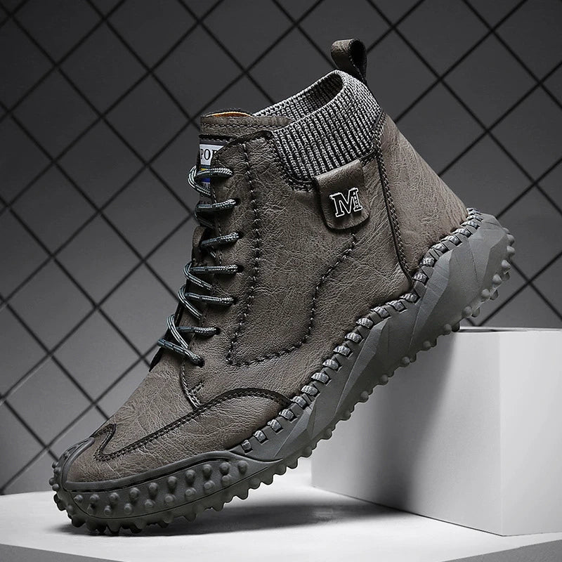 Stylish high-top leather boots in black, grey, and brown colours with a comfortable, breathable design