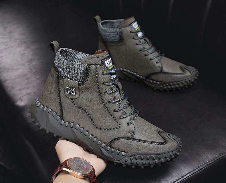 Stylish high-top leather boots in black, grey, and brown colours with a comfortable, breathable design