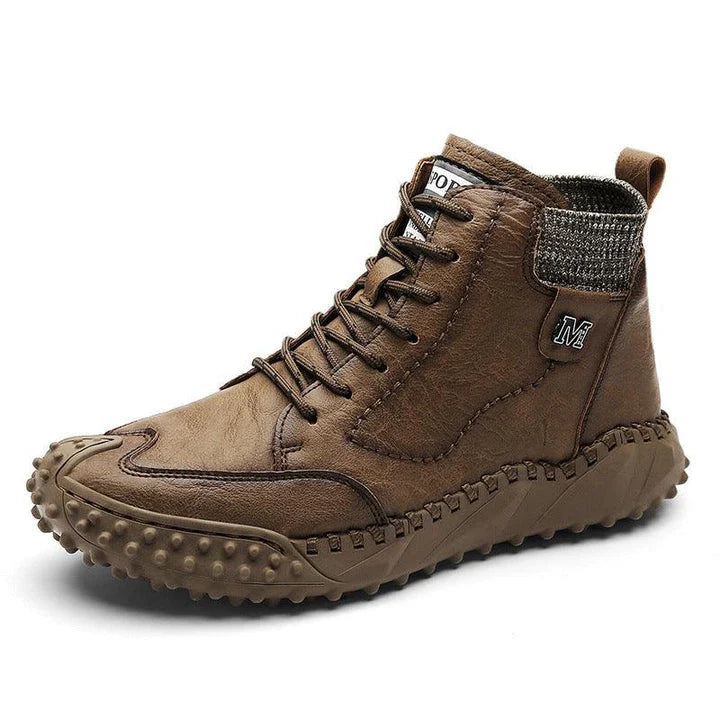 Stylish high-top leather boots in black, grey, and brown colours with a comfortable, breathable design