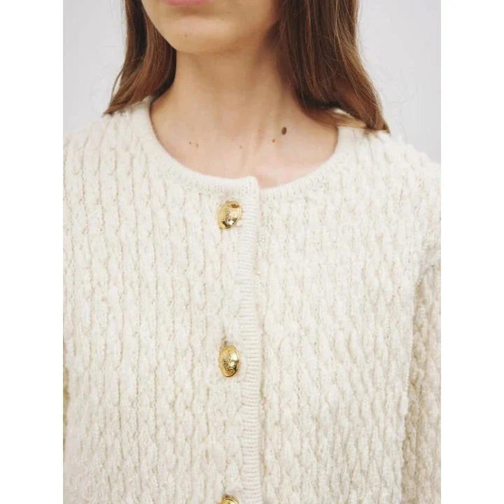 Elegant O-Neck Knitted Cardigan for Women in beige and navy blue colours, featuring a classic single-breasted silhouette and convenient front pockets