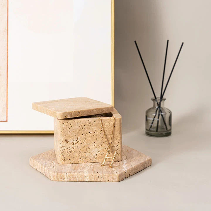 Beige natural travertine stone storage box with lid, featuring a sleek, square design and Scandinavian-inspired aesthetic