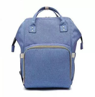 Multi-purpose large capacity mummy bag in blue, with a sleek backpack-inspired design and ample storage for parenting essentials