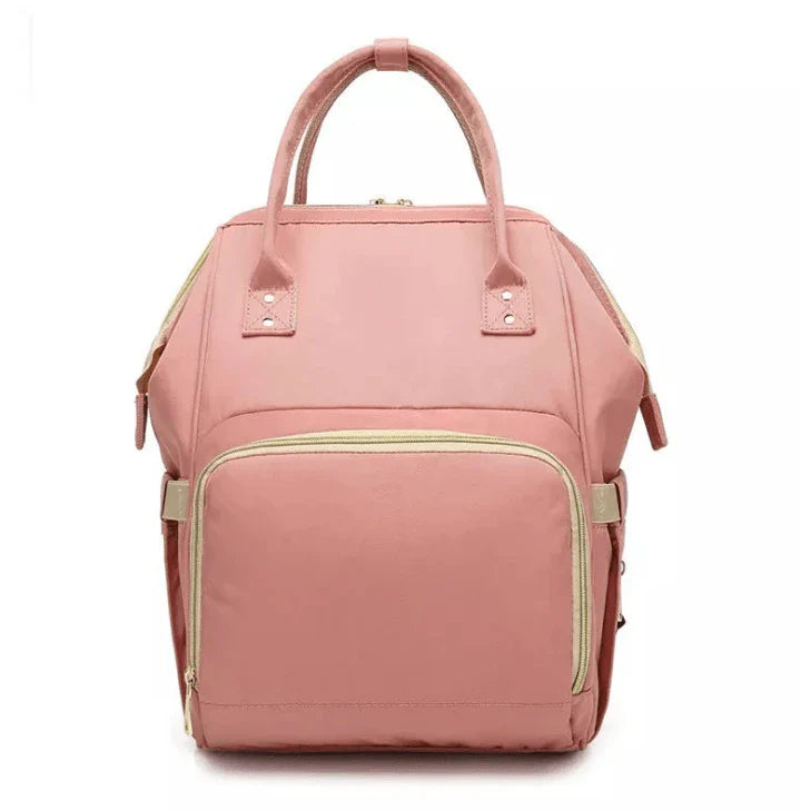 Multi-purpose large capacity mummy bag in blue, with a sleek backpack-inspired design and ample storage for parenting essentials