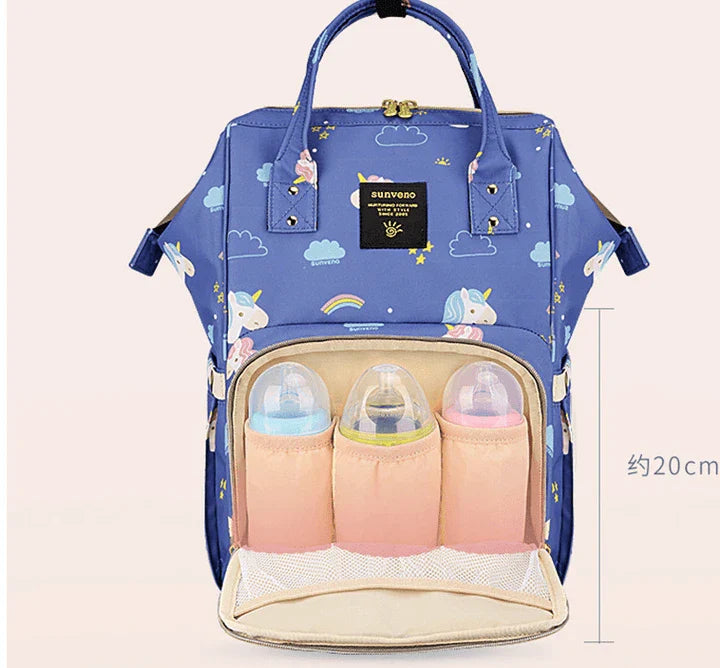 Multi-purpose large capacity mummy bag in blue, with a sleek backpack-inspired design and ample storage for parenting essentials