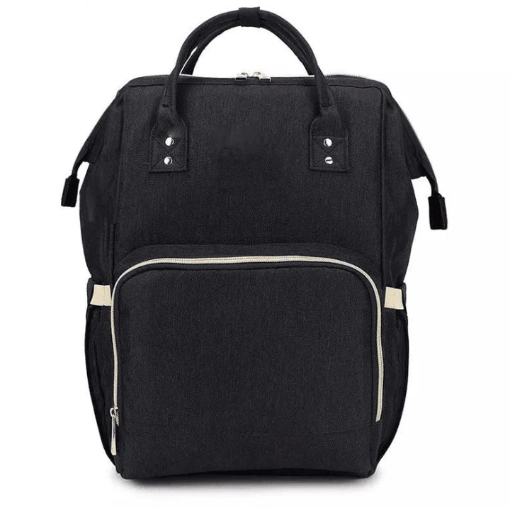 Multi-purpose large capacity mummy bag in blue, with a sleek backpack-inspired design and ample storage for parenting essentials