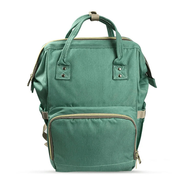 Multi-purpose large capacity mummy bag in blue, with a sleek backpack-inspired design and ample storage for parenting essentials