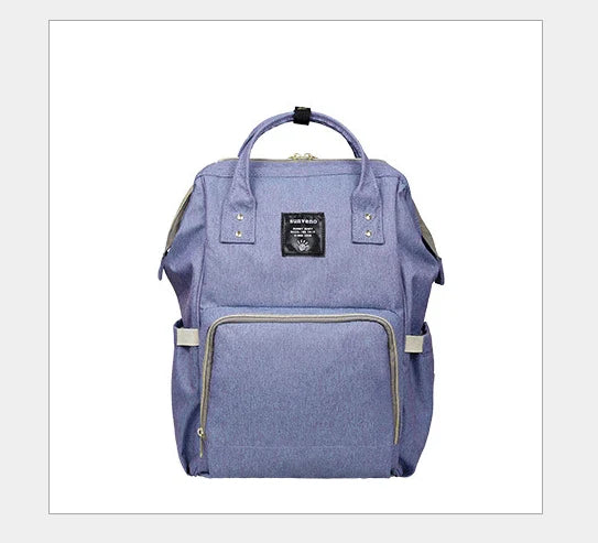 Multi-purpose large capacity mummy bag in blue, with a sleek backpack-inspired design and ample storage for parenting essentials
