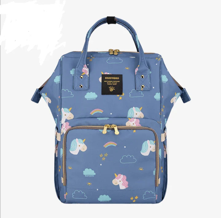 Multi-purpose large capacity mummy bag in blue, with a sleek backpack-inspired design and ample storage for parenting essentials