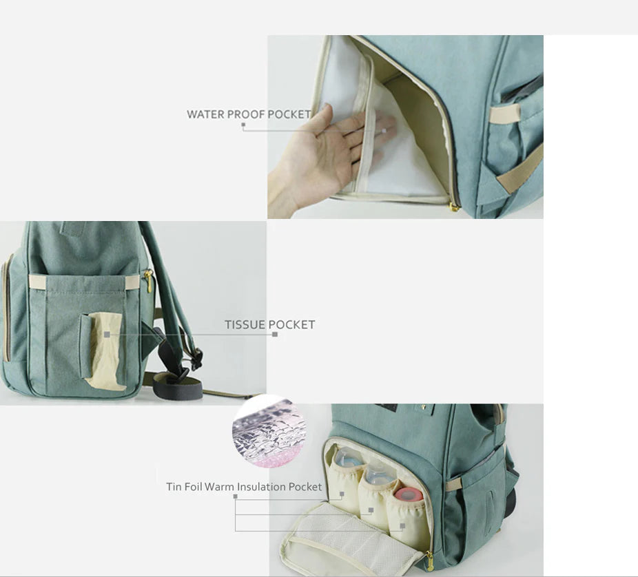 Multi-purpose large capacity mummy bag in blue, with a sleek backpack-inspired design and ample storage for parenting essentials
