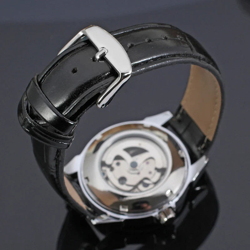Hollow Automatic Mechanical Watch with stainless steel case, transparent case back, and elegant design