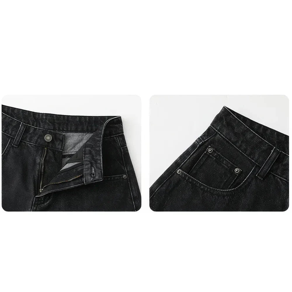 Women's high-waisted denim shorts with asymmetric hemline in black colour