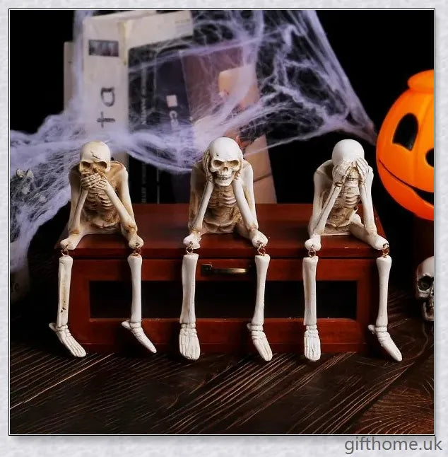 Boneyard Halloween Skeleton Ornaments, a set of 3 lifelike resin skeletons for spooky seasonal decor