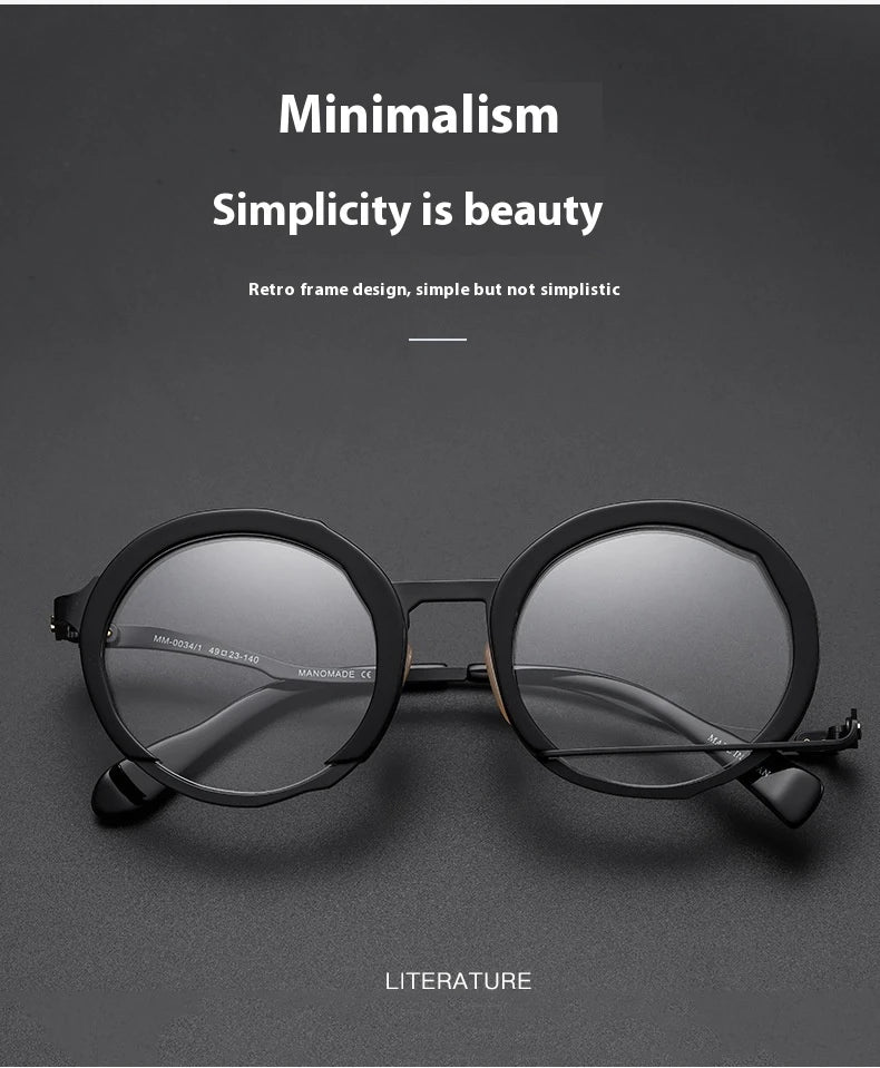 A close-up view of a premium fashion metal spectacle frame in black, white gold, and black gold colours.