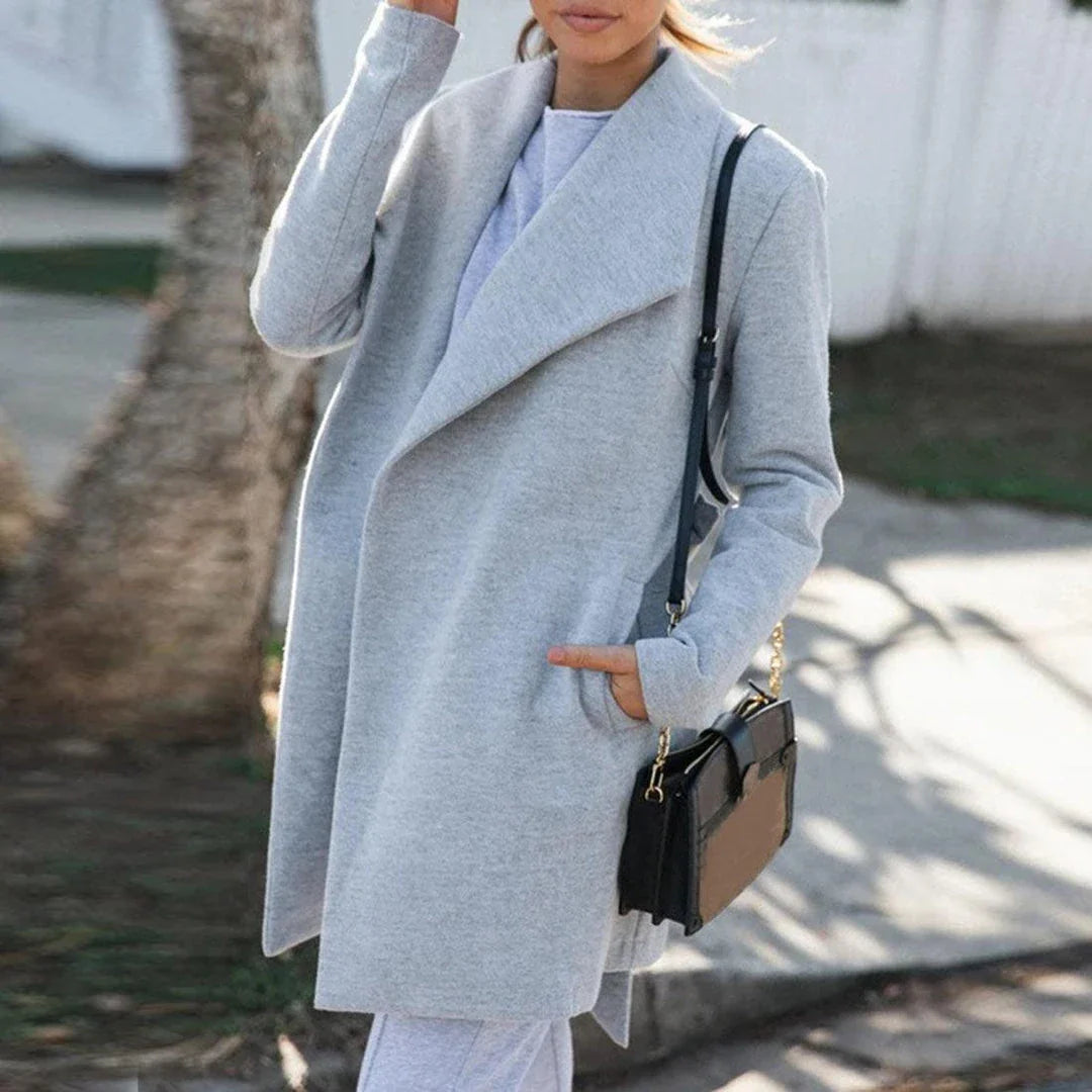 Premium polyester fibre trench coat in solid grey or black colour, with a timeless silhouette and flattering fit