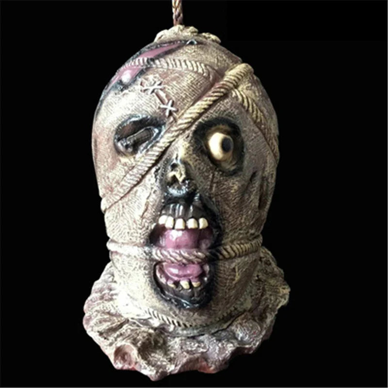 Chilling Halloween Secret Room Decapitation Decoration Horror Props with voice-activated sensor, red LED eyes, and swaying severed arm
