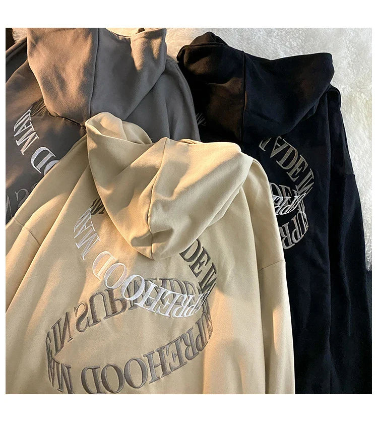 Retro American-inspired sweater cardigan in dark grey, featuring a relaxed, classic silhouette for versatile layering and all-day comfort.