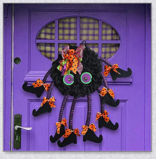 Spooky Halloween Multi-Legged Witch Wreath with vibrant colours, unique design, and adjustable legs