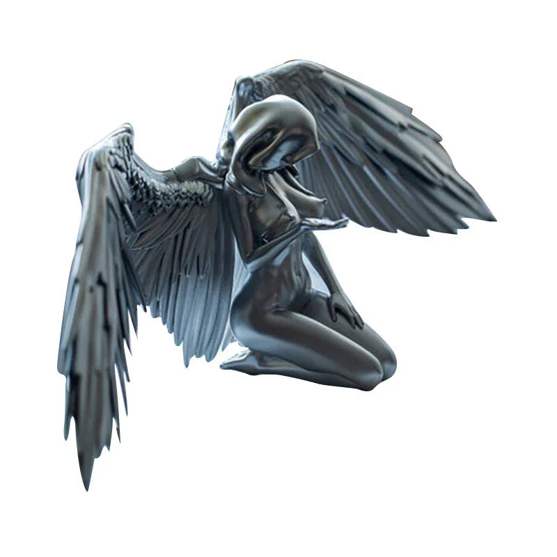 Elegant silver angel wings resin ornament with intricate feather detailing and a warm, ambient glow