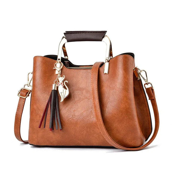 Stylish and versatile ladies handbag in black, featuring a horizontal square design with multiple interior compartments for optimal organisation.