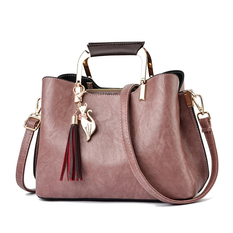Stylish and versatile ladies handbag in black, featuring a horizontal square design with multiple interior compartments for optimal organisation.
