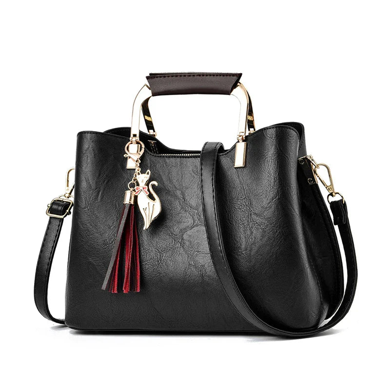 Stylish and versatile ladies handbag in black, featuring a horizontal square design with multiple interior compartments for optimal organisation.