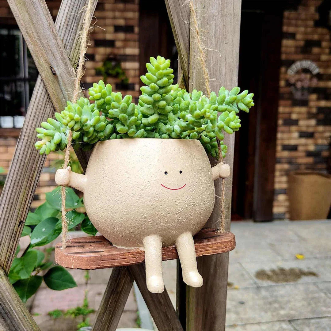 Flower Pot Wall Planter Swing Face with a charming face-shaped design for adding unique personality to your home or garden