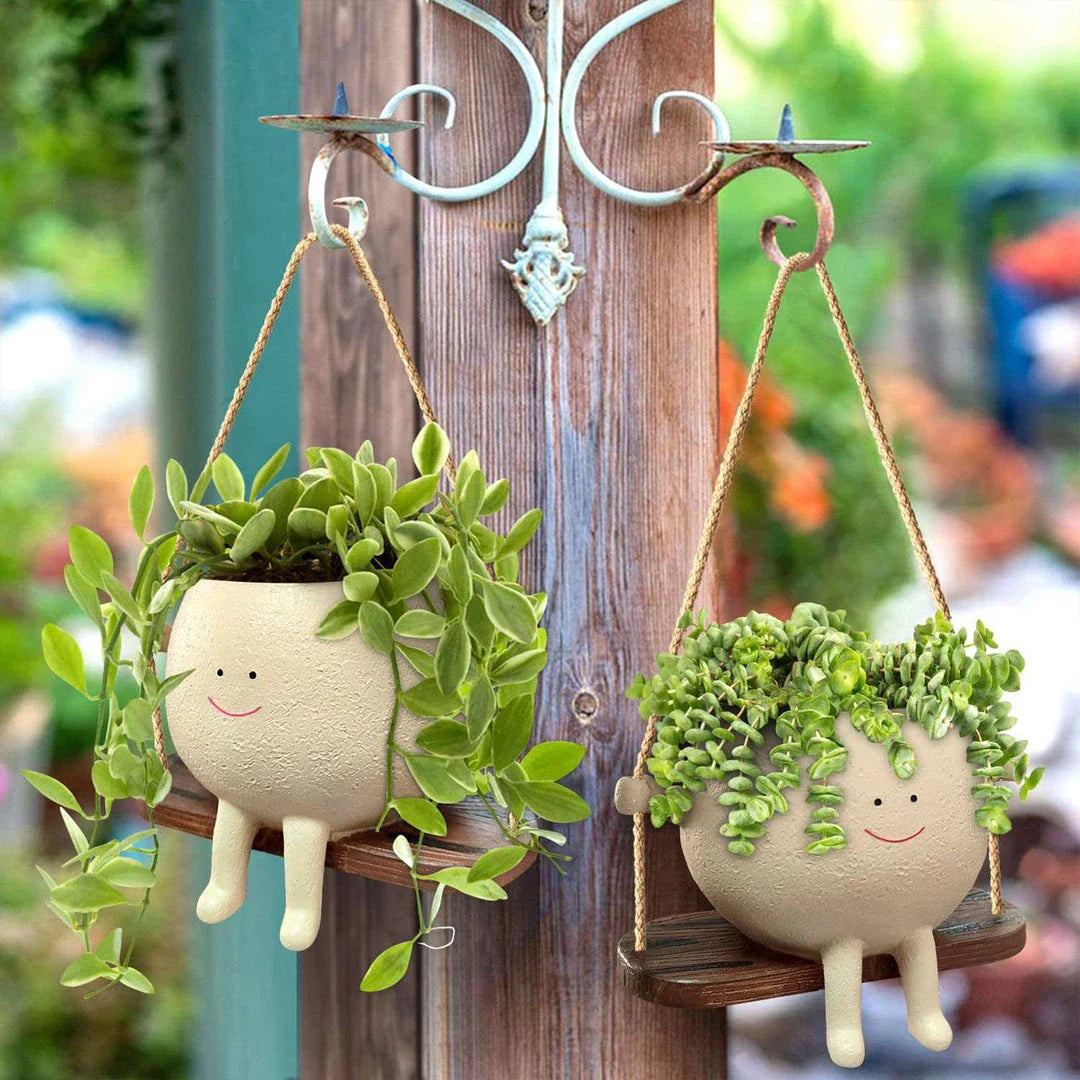 Flower Pot Wall Planter Swing Face with a charming face-shaped design for adding unique personality to your home or garden