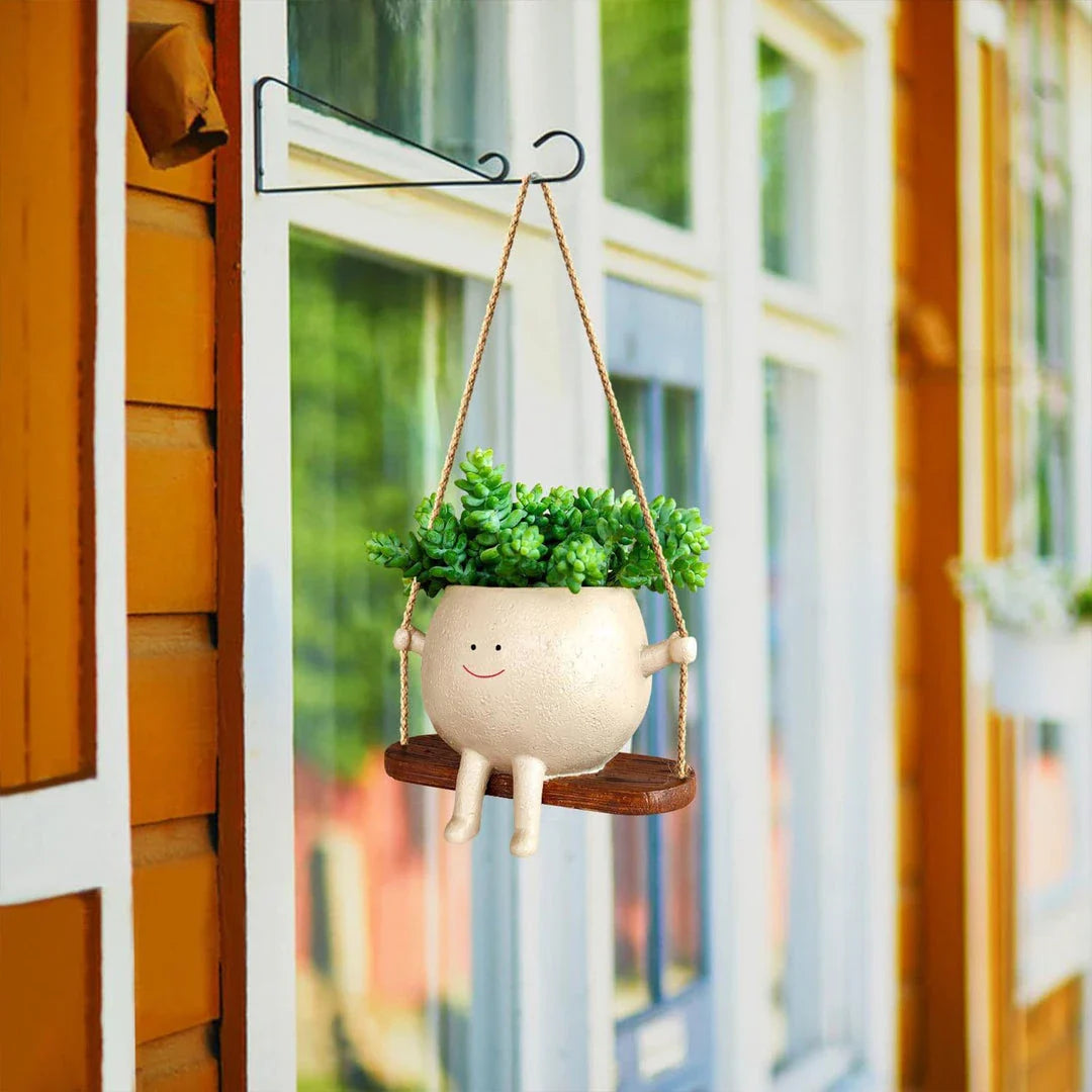 Flower Pot Wall Planter Swing Face with a charming face-shaped design for adding unique personality to your home or garden