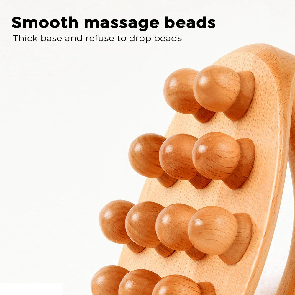Handheld massage brush made of natural beech wood with smooth massage beads for relaxation and self-care