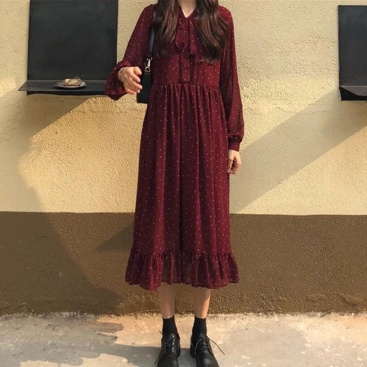 Chiffon loose sweet wave dot dress with a relaxed fit and midi-length skirt, featuring a delicate wave pattern and polka dot design