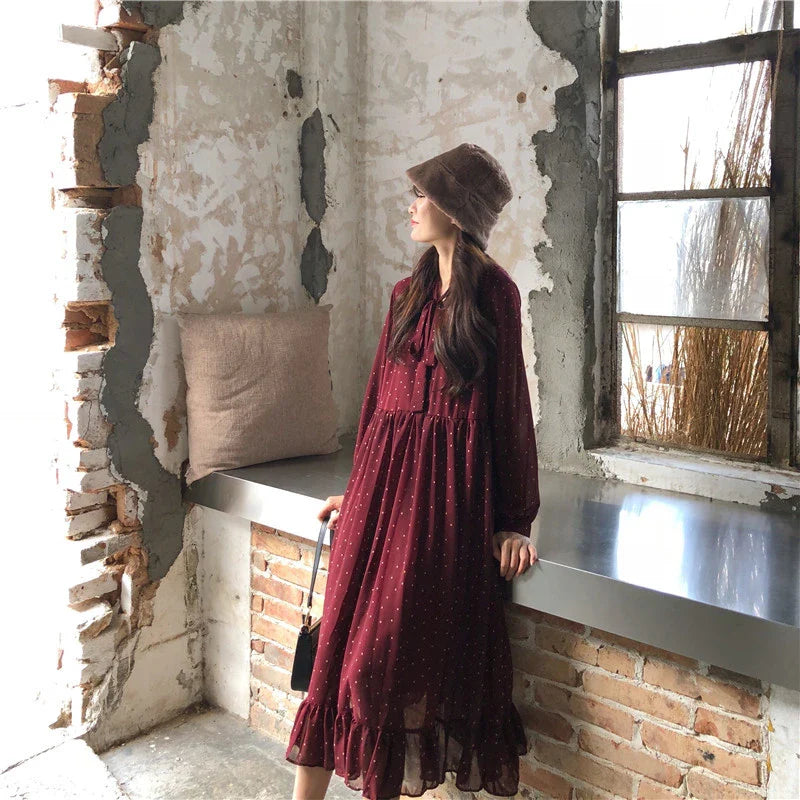 Chiffon loose sweet wave dot dress with a relaxed fit and midi-length skirt, featuring a delicate wave pattern and polka dot design