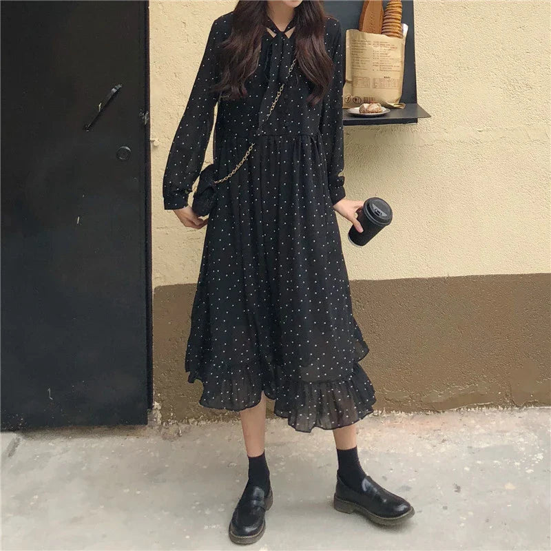 Chiffon loose sweet wave dot dress with a relaxed fit and midi-length skirt, featuring a delicate wave pattern and polka dot design