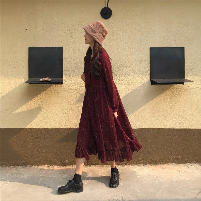 Chiffon loose sweet wave dot dress with a relaxed fit and midi-length skirt, featuring a delicate wave pattern and polka dot design