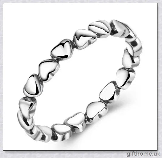 Elegant 925 sterling silver heart-shaped ring with a lustrous finish, perfect for any occasion