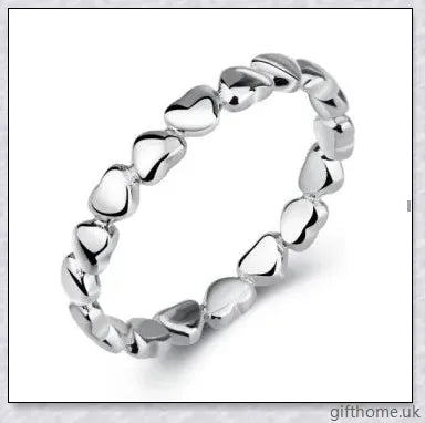 Elegant 925 sterling silver heart-shaped ring with a lustrous finish, perfect for any occasion