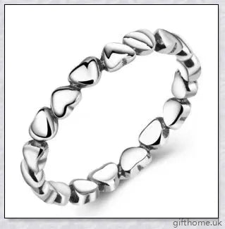 Elegant 925 sterling silver heart-shaped ring with a lustrous finish, perfect for any occasion