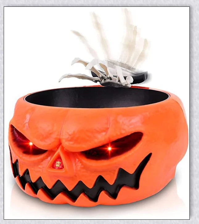 Pumpkin-shaped candy bowl with a creepy moving skeleton hand that jumps out to startle guests, ideal for Halloween decorations and parties.