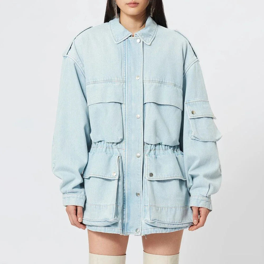 Model wearing a stylish patchwork denim jacket with practical pockets and a refined collar design