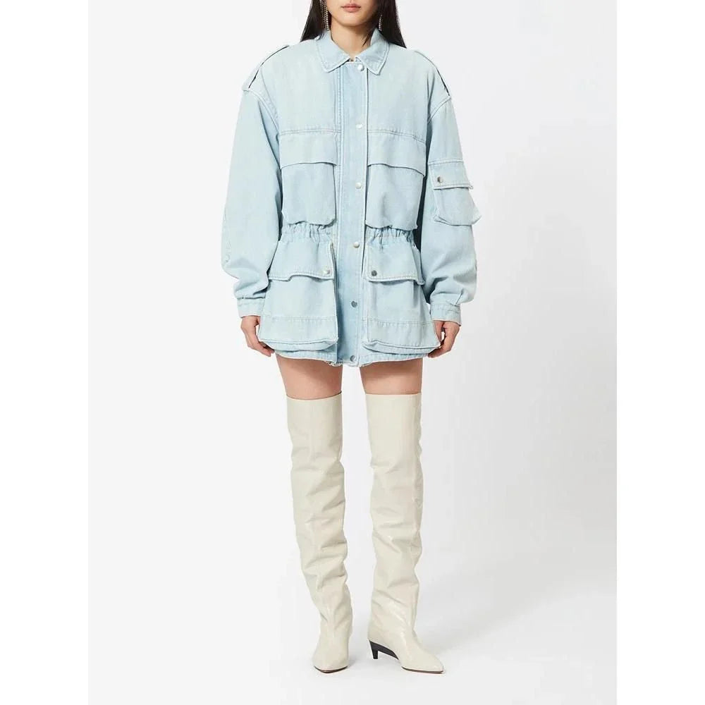 Model wearing a stylish patchwork denim jacket with practical pockets and a refined collar design