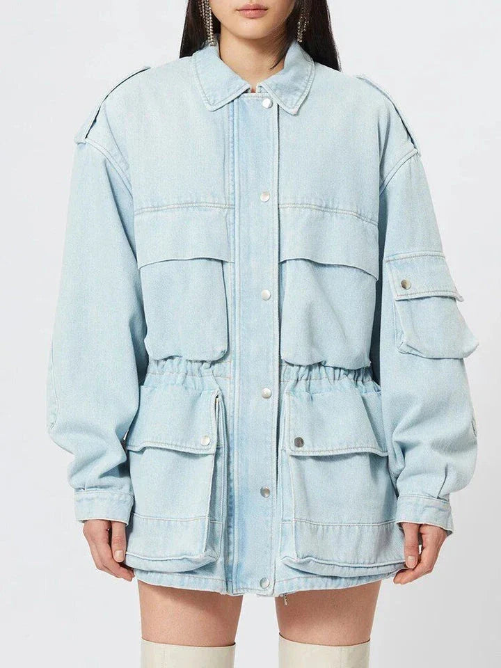 Model wearing a stylish patchwork denim jacket with practical pockets and a refined collar design