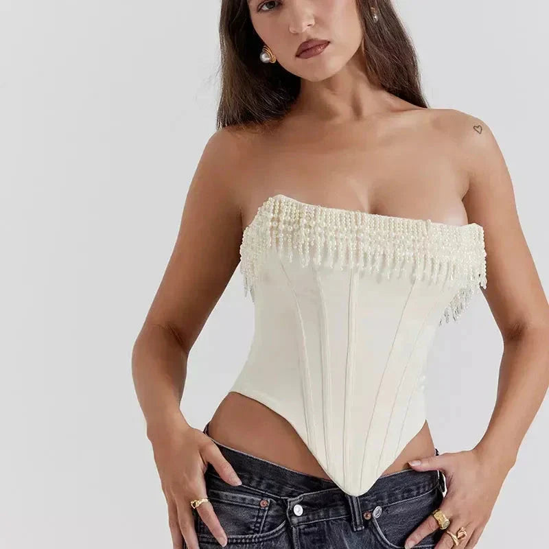 Chic strapless corset top with beaded and tassel details, made from high-quality synthetic fibres for a flattering and comfortable fit.