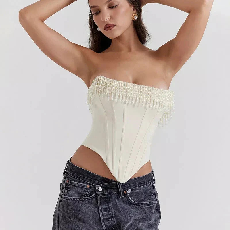 Chic strapless corset top with beaded and tassel details, made from high-quality synthetic fibres for a flattering and comfortable fit.