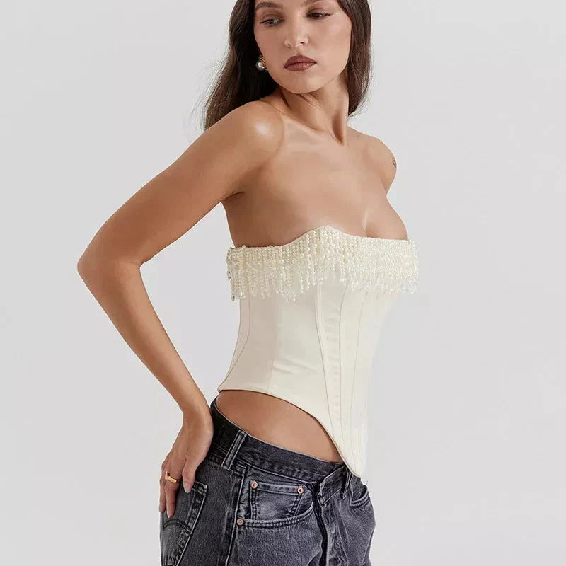 Chic strapless corset top with beaded and tassel details, made from high-quality synthetic fibres for a flattering and comfortable fit.